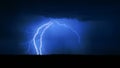 Several lightning strikes during a strong thunderstorm over the lake Royalty Free Stock Photo