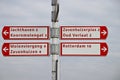 Several local destinations on red white desination signs for cyclist around the Rottemeren in the Netherlands Royalty Free Stock Photo