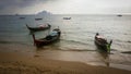 Several Long tail boat in sunset in Railay Beach, Thailand Royalty Free Stock Photo