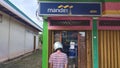 Several Mandiri Bank customers are queuing to make transactions at ATM machines