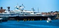 Several mega-yachts moored at the billionaires` docks, Antibes, France Royalty Free Stock Photo