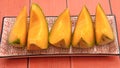 Melon wedges on a table Royalty Free Stock Photo