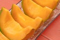 Melon wedges on a table Royalty Free Stock Photo