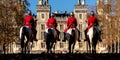 Several men riding on horseback