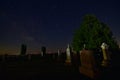 Nightfall in a Wisconsin Cemetery with old grave markers rows in the moonlight Royalty Free Stock Photo