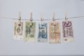 Several old Soviet banknotes on a rope