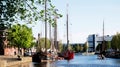 Vintage vessels lay aloong side a canal wall in the city of Leeuwarden the Netherlands Royalty Free Stock Photo