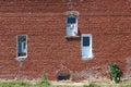 old vintage warehouse windows red brick building Royalty Free Stock Photo