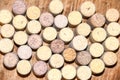 Several old wine corks stand on wooden background top Royalty Free Stock Photo