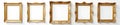 Several ornate golden frames against a stark white wall, luxury, decor, frame
