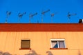 Several outdoor antennas to capture television signals on the roof of a building in Spain