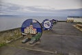 several panels with colorful mosaics on the coast. Cape Finisterre