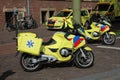 Several paramedic vehicles like motors and cars waiting in the Hague