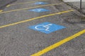several parking spaces reserved for drivers with special abilities Royalty Free Stock Photo