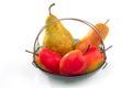 Several pears of various varieties in a fruit bowl