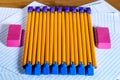 Several pencils in opposing direction with pencil erasers placed Royalty Free Stock Photo