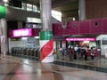 Several people buy tickets in one of the lobbies of KL Central Station in Kuala Lumpur Royalty Free Stock Photo