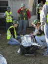 Several people helping the injured person Royalty Free Stock Photo