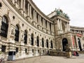 Several people near the majestic building