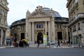 Several people walking across street or standing in groups, Forum Des Halles, Paris, France, 2016