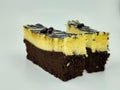several pieces of brownie cake on a white background