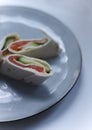 several pieces of pita roll stuffed with melted green juicy cucumber Royalty Free Stock Photo