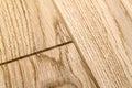 Several planks of beautiful laminate or parquet flooring with wooden texture as background