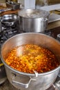 Several pots cooking on hotplate Royalty Free Stock Photo
