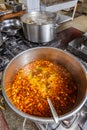 Several pots cooking on hotplate Royalty Free Stock Photo