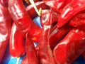 Several Red hot shiny chilli peppers Royalty Free Stock Photo