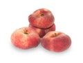 Several ripe red and yellow flat peaches isolated