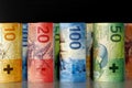 Several rolled-up Swiss banknotes Royalty Free Stock Photo
