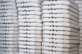 Several rows of pizza boxes, white pizza packing containers