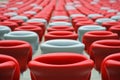 Several rows of red and white stadium seats Royalty Free Stock Photo