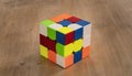 Budapest, Hungary; 9 february 2019: Several Rubik cubes intelligence toys unsolved, in a wood table