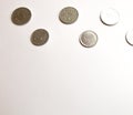 Several Russian coins lie on a white isolated background at the top. Shiny Russian metal money. Place for text