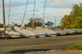 Several sailing boats resting on the shore