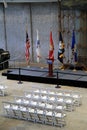 Several seats arranged in front of military flags, National WWII Museum, New Orleans, 2016