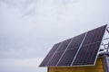 Several sections of solar panels on the roof of a house Royalty Free Stock Photo