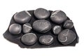 Several shungite stones isolated on a white background