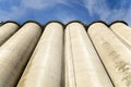 Several Silos farm agriculture tank with cloudy sky