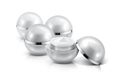 Several silver sphere cosmetic jar on white