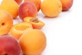 Several sliced apricots isolated on white