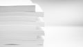 Several stacks of white paper on a white background Royalty Free Stock Photo