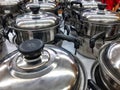 several stainless pans for cooking that are sold at the super market