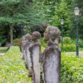 Several stone statues of persons on a row in a park of Bouvigne Castle at Breda, Netherlands