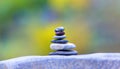 Several stones on blurred beautiful background Royalty Free Stock Photo