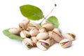 Several Tasty pistachio nut with leaves isolated on white background