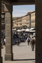 Several tourists walk along the Aqueduct Avenue, Segovia Royalty Free Stock Photo