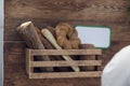 Several types of bread in a wooden display case